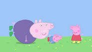 Peppa pretending to be a butterfly, with the others pretending to be worms