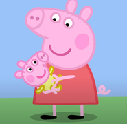 Peppa holding Baby Alexander