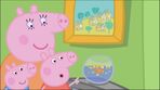 Peppa, George and Mummy Pig looking at Goldey the Fish