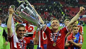 Lahm schweinsteiger cl pokal