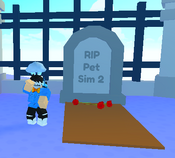 A large gravestone, with roses at its foot, reading 'RIP Pet Sim 2'