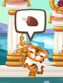 A hungry orange tiger petling