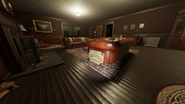 The Ouija Board spawns next to one of the couch in the Living Room.