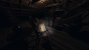 Ouija Board in Bleasdale Farmhouse, Attic. On rocking chair in corner. Looking towards the staircase. 1