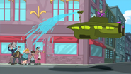 He then squirts water over the citizens.