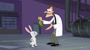 Doofenshmirtz hands him the transmogrification backpackanatior.