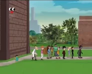Perry watches as Doofenshmirtz and the class head back to their classroom in relief