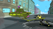 The Beak throws Khaka into a building.