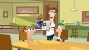 CK-12-Lawrence showing a page in a book to Phineas and Ferb