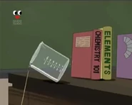 Wendell pulling a beaker by accident, causing several books to fall off