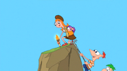 Candace climbs a mountain.