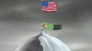 Roger hangs onto the flagpole as the Earth moves back into orbit.