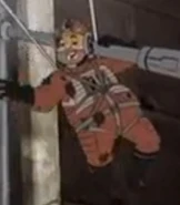 Party Pooper Porkins arrives.