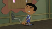 Baljeet struggling to turn the crank.