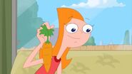 Candace with a carrot to motivate Dennis.