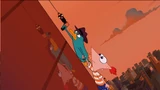 Perry using a grapple hook to pull himself and Phineas up to Doof's building.