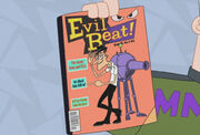 Monogram holding Evil Beat! magazine