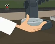 Doofenshmirtz placing the hair sample inside a Petri dish