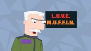 Major Monogram tells Perry of a L.O.V.E.M.U.F.F.I.N. meeting.
