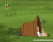 Doofenshmirtz accidently falls into the ground with the bell, firing the syringe into the air