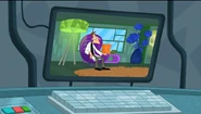Doof is sitting in a chair, disappointed,