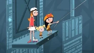 She takes one of Candace's rollerskates and gets ready to swing across.