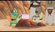 To make peace, Perry bakes a new cake for the Tusken Raider birthday boy.