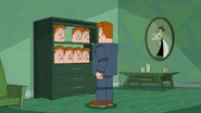 Norm with a closet filled with Norm heads.jpg (121 KB) Norm and his many heads.