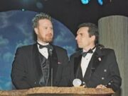 Dan and Swampy accept an award