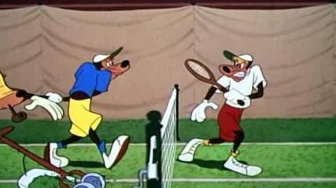 Dingo joue au tennis