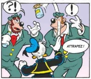  lance un pot de miel devant deux gorilles.