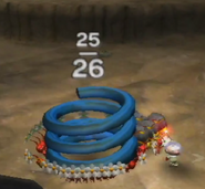 A screenshot of Pikmin carrying the Gravity Jumper in Pikmin