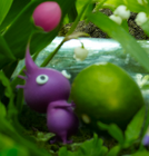 A Purple Pikmin shown on the expanded box art for Pikmin 3.