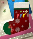 A stocking featuring a Red, Yellow, and Blue Pikmin found within the level.