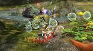 Alph and an army of Pikmin are attacking a Peckish Aristocrab.