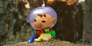 Clay Art from Pikmin 2 of Olimar plucking a Blue Pikmin.