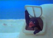 Mrs. Peng-Sniff tells Pingu and Pingg off for making noise