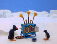 Pingu with Mr. Peng-Hoven in Pingu and the Barrel Organ.