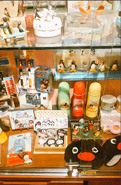 Various Pingu merch displayed at the cafe.