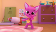 Pinkfong pointing at camera