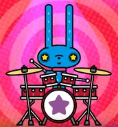 Momo playing the drums.png (314 KB) Momo playing the drums