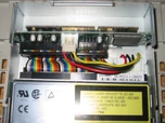 Closeup of MO drive mechanism and X-PCI to SCSI adapter board.