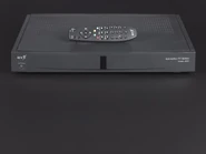 BT Voyager 2000 Interactive TV System and remote.jpg (71 KB) Voyager 2000 Interactive TV System with a remote featuring button colors are similar to those on a Pippin AppleJack controller.