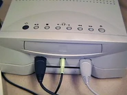 Pippin combo dock front.jpg (61 KB) Front of a prototype combo dock with a floppy drive in the front and an ethernet port in the back.