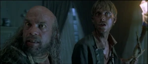 Pintel and Ragetti looking for Elizabeth Swann inside the Governor's mansion.