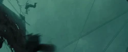 Igmar and Fauntleroy fall from the mast of the Flying Dutchman following a failed attempt to kill Captain Jack Sparrow.