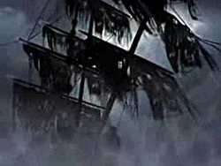 The Black Pearl sails through the night.