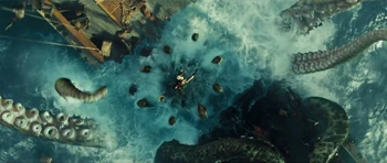 A screaming sailor falls into the Kraken's mouth.