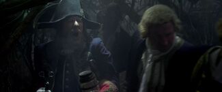 Barbossa's crew journeying through thick jungle.