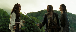 Norrington threatens Jack Sparrow with his cutlass.